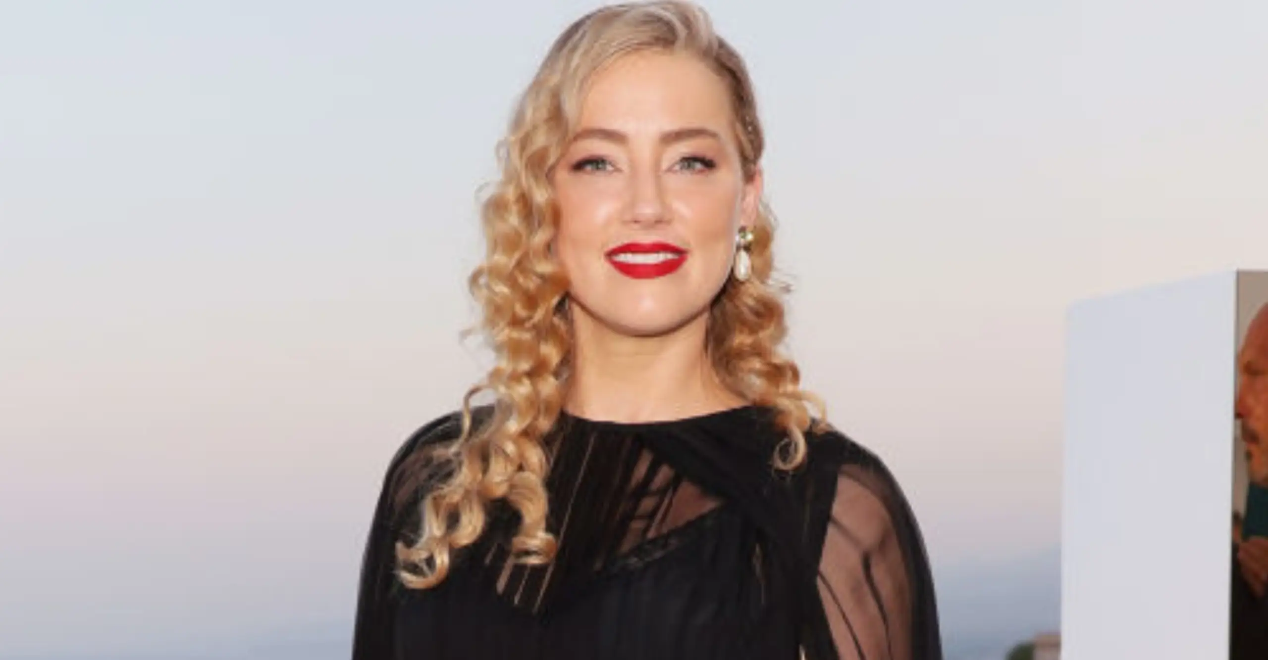 Amber Heard shares photos of her new life in rare social media post after moving to new country and changing her name