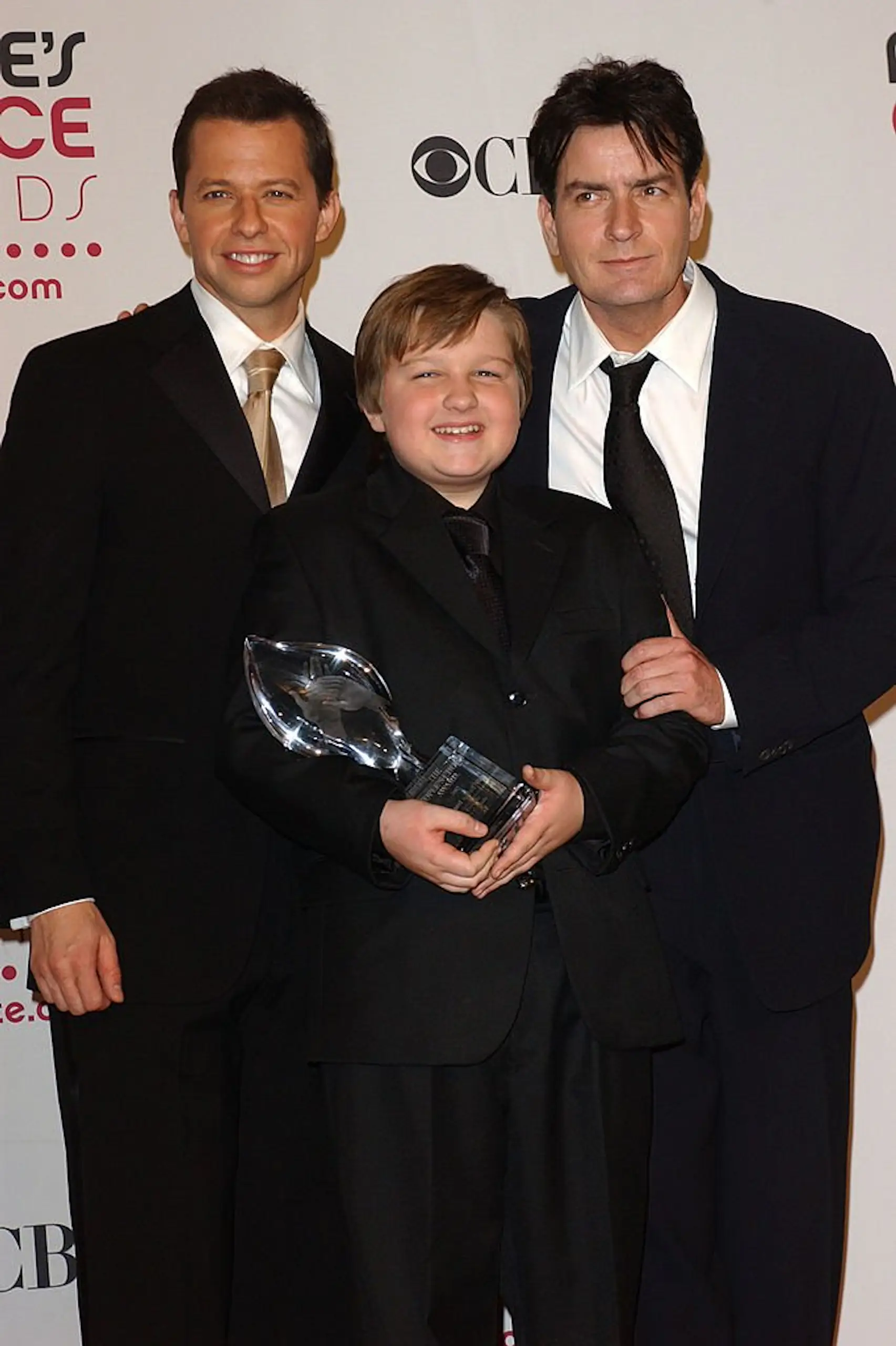 Angus T. Jones with Jon Cryer and Charlie Sheen at the beginning of the show. Credit: Albert L. Ortega / Getty