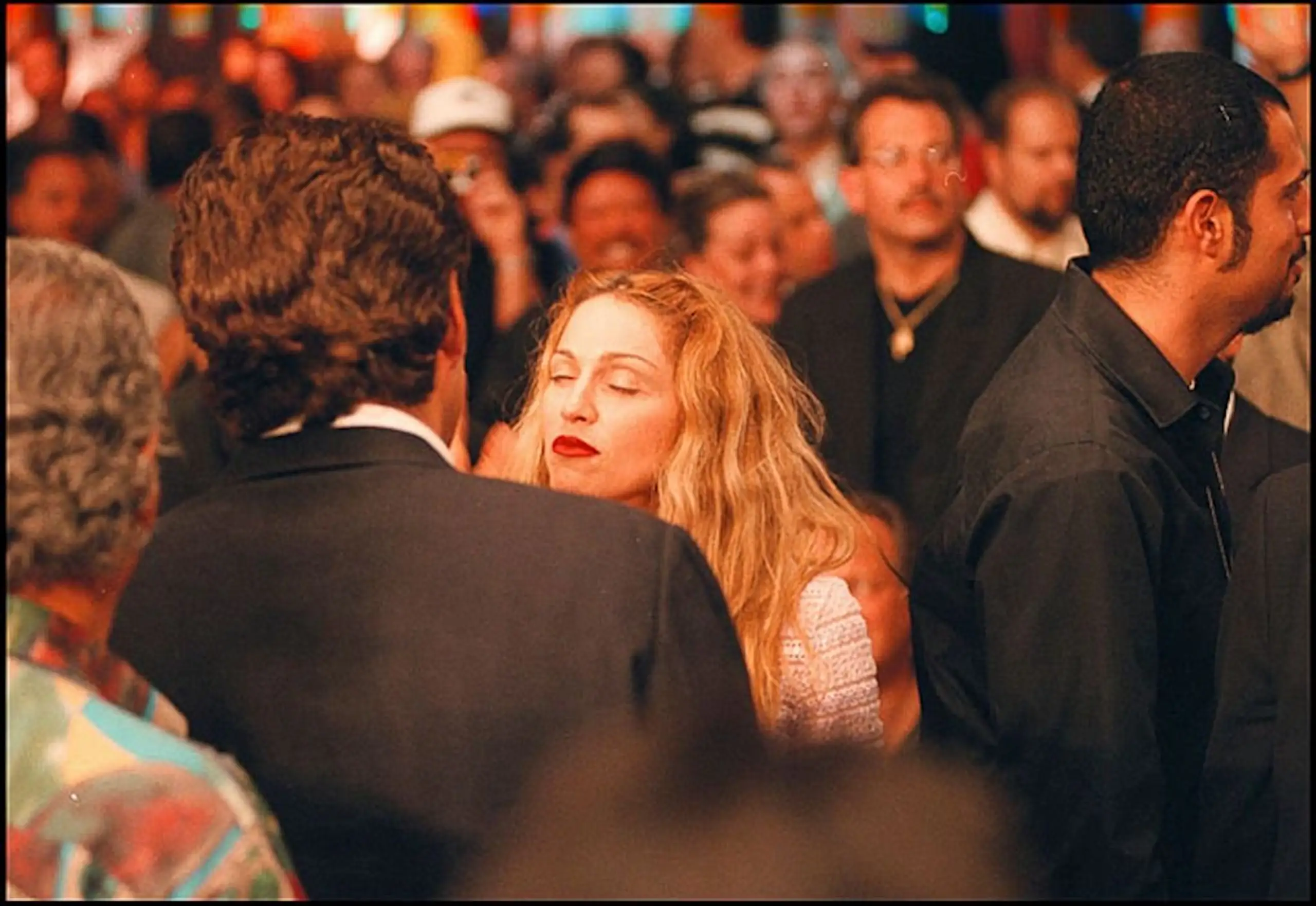 Kennedy Jr and Madonna talking at the MGM Grand Garden Arena in 1997. Credit: Michael Brennan / Getty 