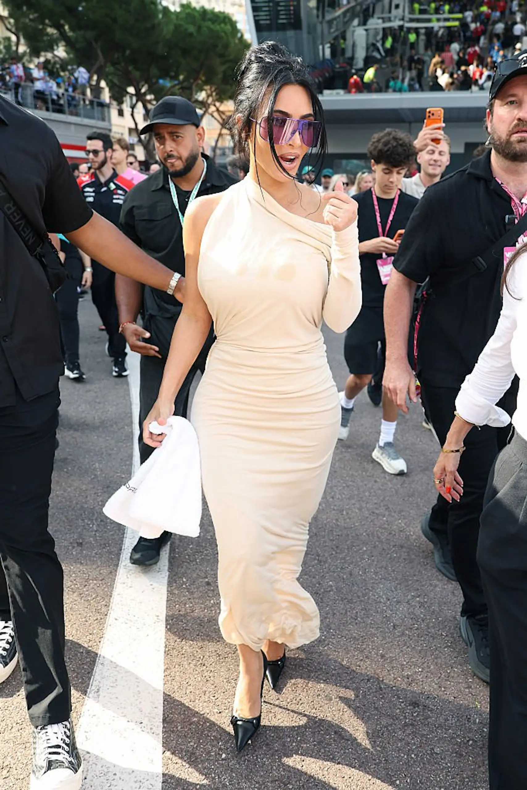 Kim Kardashian holding the towel at the F1 Grand Prix of Monaco. Credit: Pascal Le Segretain / Getty