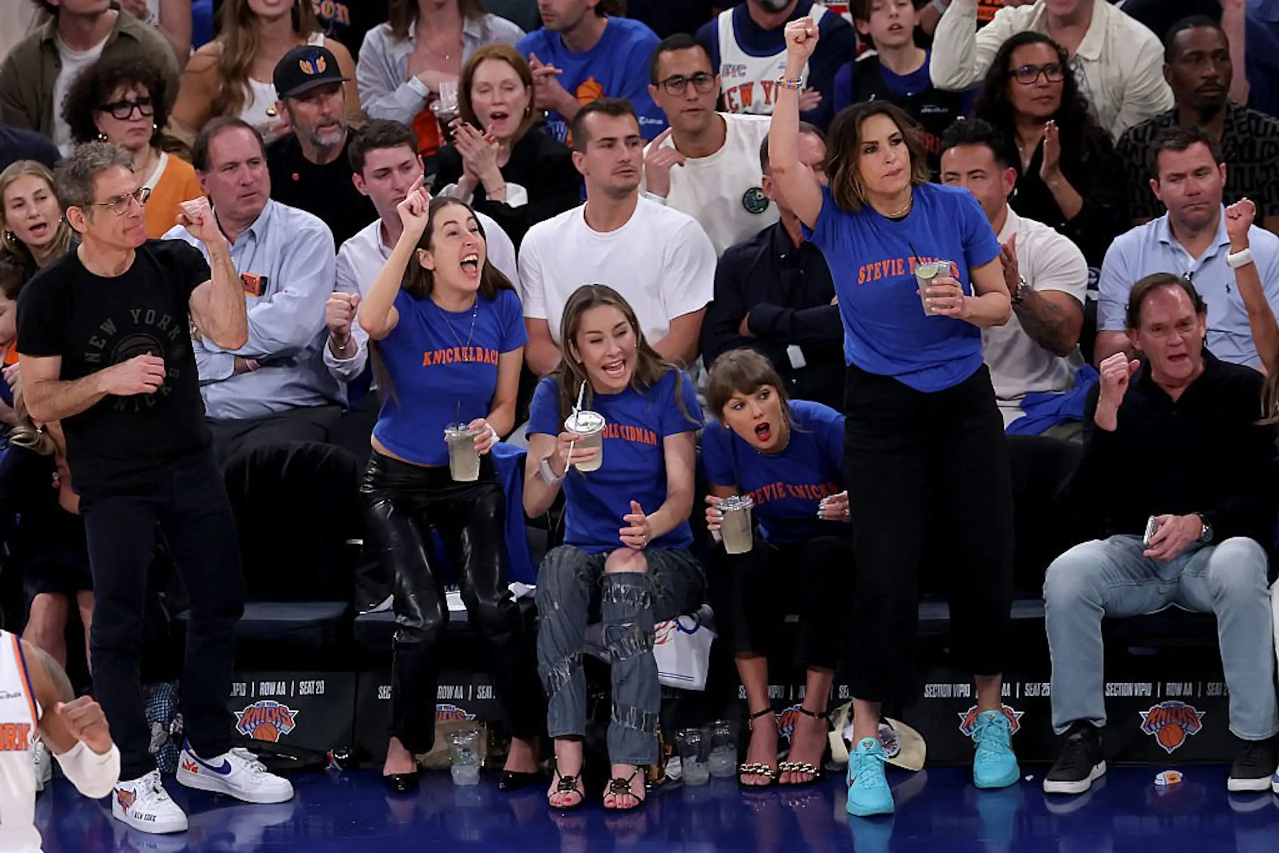 Alana Haim, Este Haim, Taylor Swift, and Mariska Hargitay attend Game Four of the 2026 NBA Finals. Credit: Al Bello / Getty