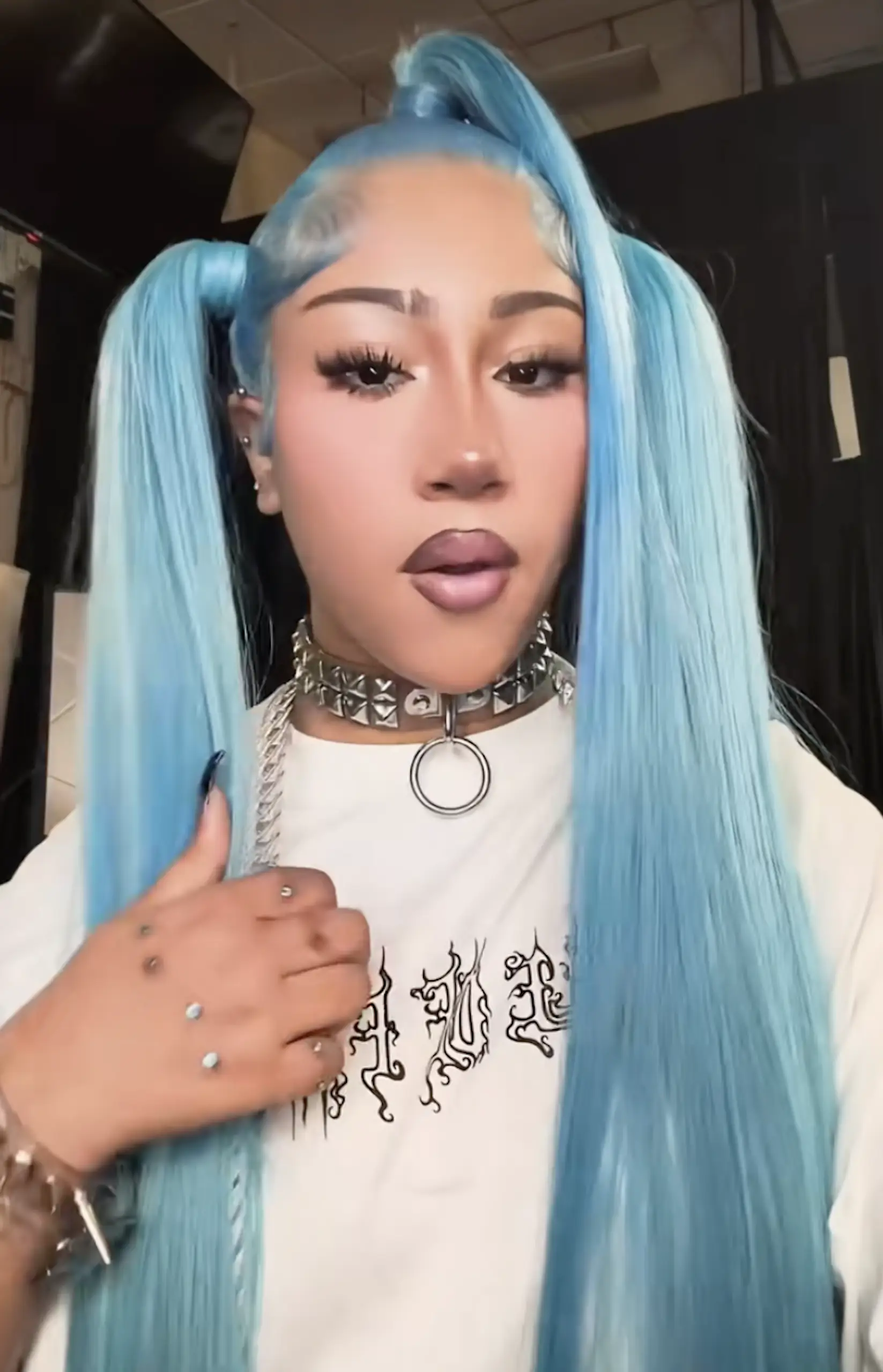 The teenager's piercings have sparked discussions. Credit: TikTok/@kimandnorth