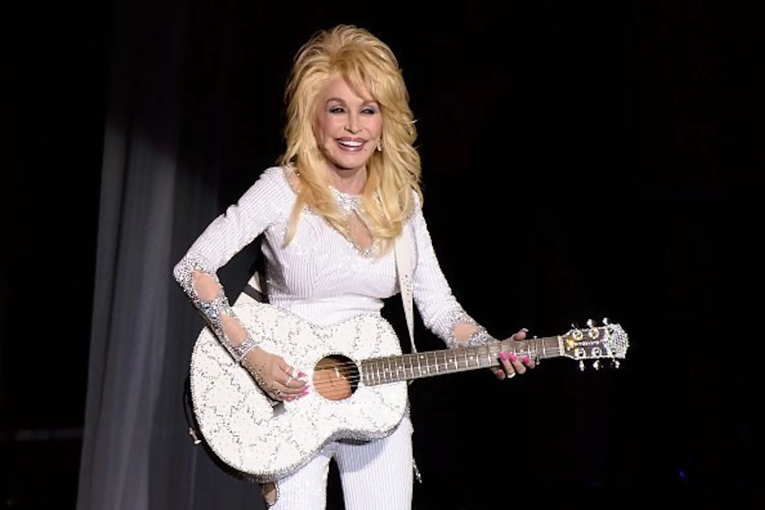 Dolly Parton was known for her signature wigs. Credit: Daniel Boczarski/Getty Images